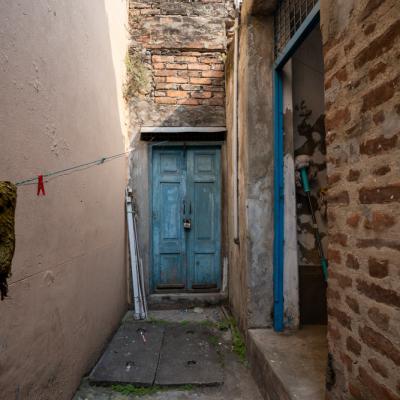 The Closed Entry Door To The Property From East
