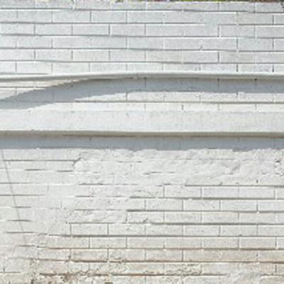 The Exterior Brick Wall In White Color