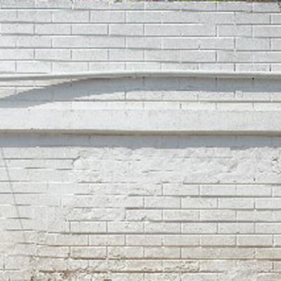 Brick Wall Painted White On The Exterior